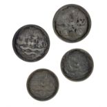 A set of four Japanese mirrors, Edo period the four of them decorated in relief, the central knop