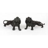 A Pair of Japanese Bronze Lions, Meiji / Taisho period powerfully cast, the mane well delineated,