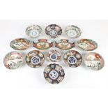 A Collection of Japanese Imari Bowls , trays and a saucer , Meiji Period (13) comprising four pairs