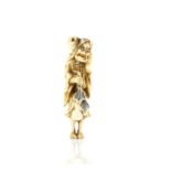 A Japanese Netsuke , Meiji Period Carved Ivory representing a man with a frog  . 7.4 X 2  cm,