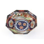 A Japanese Imari Octogonal Bowl , Meiji period, painted with Flower patterns and landscapes with