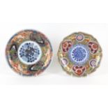Two Imari dishes , Meiji period One floral shaped , 21,4cm diameter , An apocryphal six character