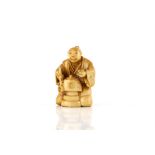 A Japanese Netsuke , Meiji Period Carved Ivory representing  a man with a pot a laddle and a cup,