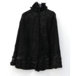 Victorian Black wool cape with applique decoration, silk ruffle collar and silk and net hem line,