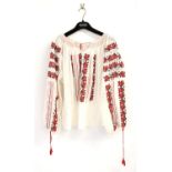 Traditional Romanian Peasant blouse embroidered in red an black cotton and whit silk floss in