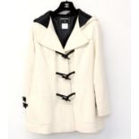 Chanel Duffle Coat labelled Autumn 06, size 42 with two front pockets, black silk lined hood and