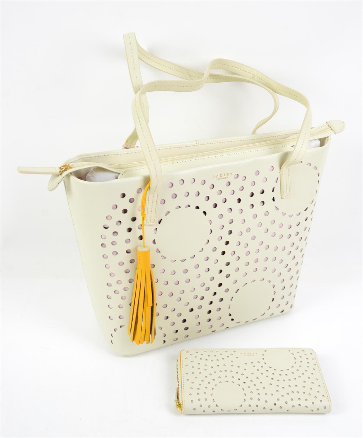 Radley Tote “De Beauvoir” in cream leather, with punched geometric design. Boxed with dust bag with