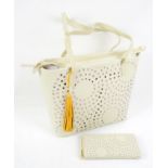 Radley Tote “De Beauvoir” in cream leather, with punched geometric design. Boxed with dust bag with