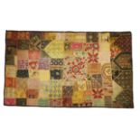 A Patchwork throw comprised of embroidered and mirrored vintage Indian fabric 99cm x 166cm