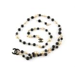 Chanel jewellery belt, with faux pearl and black beads, with two 'CC' monograms in black enamel,