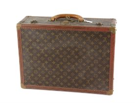 Louis Vuitton, Monogram, a coated canvas and leather hard suitcase, with leather trim,