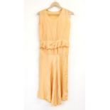 Eight 1930s and later silk and satin long night/under slips in apricot, yellow, peach pink and