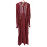 Two Cotton Uzbek style long sleeved full length dresses with applique embroidered panels,