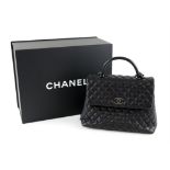 Chanel caviar leather quilted bag, with top handle, chain strap, interior zip pocket,