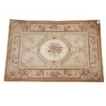 Contemporary Aubusson rug in beiges and terracotta in floral motifs 120cm x 176cm