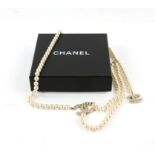 Chanel jewellery belt, with faux pearls, length 94 cm, with two faux pearl 'CC' monograms hanging,