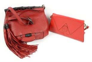 Gucci red grained leather shoulder bag with tassels and bamboo details together with a vintage