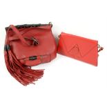 Gucci red grained leather shoulder bag with tassels and bamboo details together with a vintage