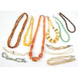 A group of mainly beaded necklaces, including one in tigers eye beads,49cm in length with chain