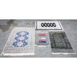 Pakistan Karachi Imperial rug, with three floral medallions on a blue ground within geometric