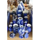 Approximately 23 Chinese blue and white prunus pattern ginger vases and dish and cover (24 in