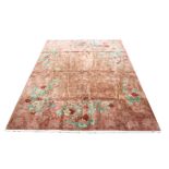 Chinese carpet with scrolling foliage and blossoming flowers on a brown ground, 365 x 272cm