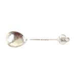 Arts and Crafts design sterling silver serving spoon with hammered bowl and partial twisted stem,