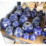 Approximately 19 Chinese blue and white prunus pattern ginger jars