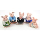 Two sets of five Wade Nat West pigs