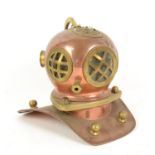 Copper and brass miniature diving helmet in the style of Siebe Gorman & Co, h17cm