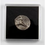 An ancient Greek silver Tarentum didrachm, 7.7 g in weight, 21 mm in diameter, rider on horseback