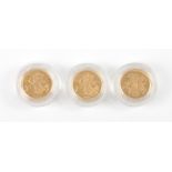 A cased pair of proof sovereign coins (2004, 2005) commercially cased by Westminster,