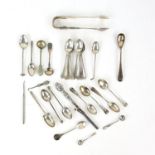 Small silver items including Victorian Scottish tongs, twenty two various small silver spoons (many