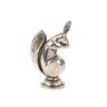 Novelty silver pepper pot cruet in the form of a squirrel eating a nut