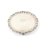 George VI silver salver with pie-crust edge and scroll feet, with engraved presentation inscription