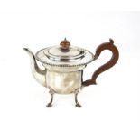 George VI small round silver tea-pot on four feet by J B Chatterley & Sons Ltd. Birmingham 1938,