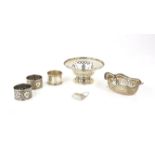 Various silver comprising two small pierced dishes, three napkin rings and a double Continental