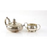 Victorian silver squat globular teapot, with ivory insulators, London 1840, 23 cm long,