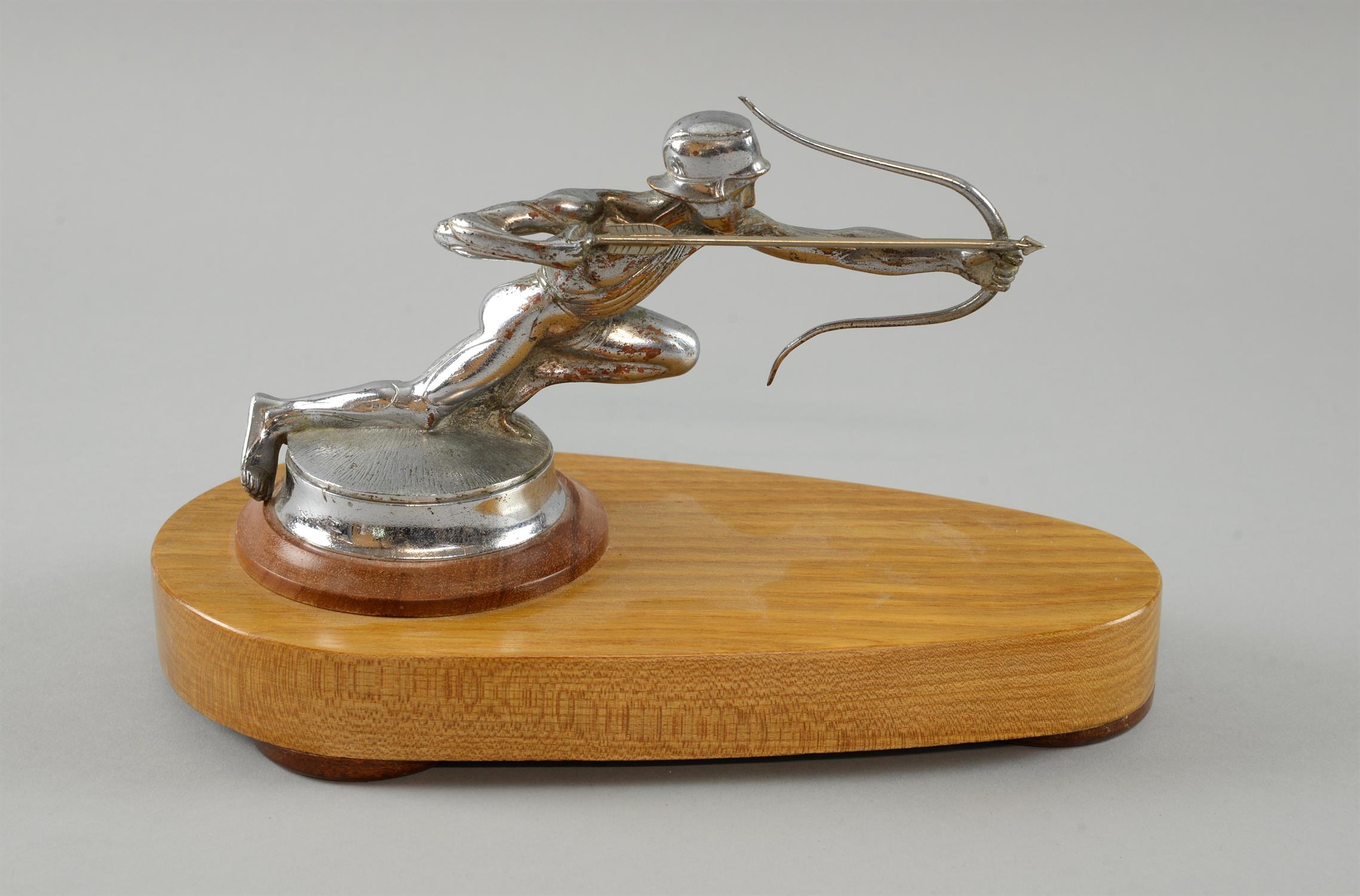 A Pierce Arrow Archer Car Mascot, from the late 1920's, mounted on a display wood base,