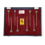 Ferrari silver cocktail sticks set of eight - prancing horse emblem on top of sticks and displayed