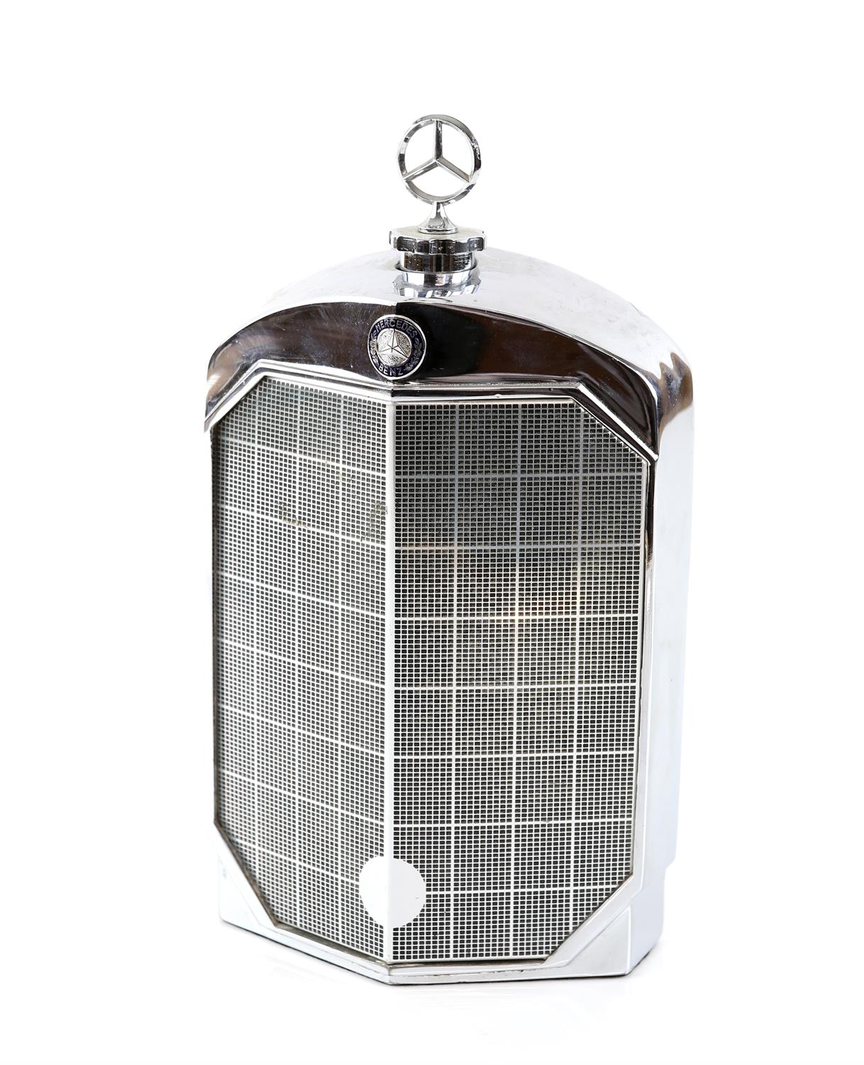 A unmarked chrome decanter in the form of Mercedes-Benz front radiator grill 22 x 12cm