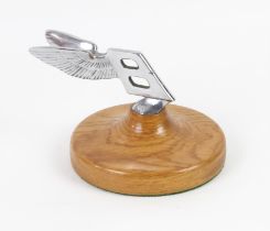 One Bentley 'Flying B' mascot on wooden plinth (12cm in height)