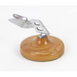 One Bentley 'Flying B' mascot on wooden plinth (12cm in height)