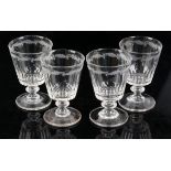 Four 18th/19th century drinking glasses with engraved oak leaf and acorn decoration,