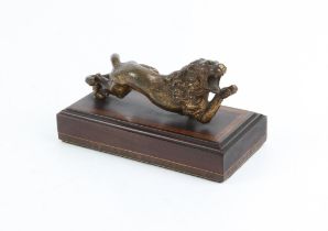 19th century gilded bronze figure of a lion on a crossbanded mahogany base, H9 W15 D7.5 cm