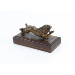 19th century gilded bronze figure of a lion on a crossbanded mahogany base, H9 W15 D7.5 cm