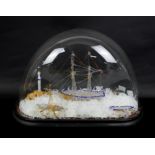 Late 19th century glass model frigger of a ship, under glass dome on ebonised base, dome 25cm high,
