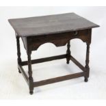 Late 17th/Early 18th century oak side table, the rectangular top with moulded edge over a frieze