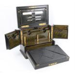 Late Victorian leather bound travelling stationery cabinet and writing slope, the hinged top and