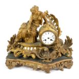 Late 19th century French gilt metal mantel clock, with stand